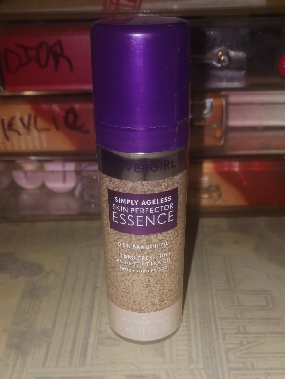 COVERGIRL Simply Ageless Skin Perfector Essence — Purple Cap, Beige Tint